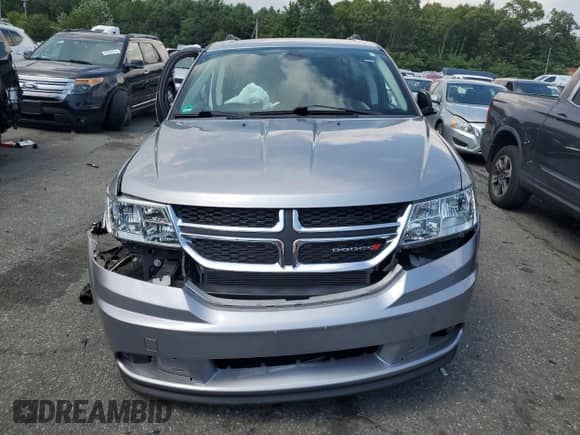 2018 Dodge Journey SE with VIN 3C4PDCABXJT495526, listed as a Copart auction lot 66272005 with 87,947 mi miles and Salvage title. Bid and sale history available at DreamBid. Image 5.