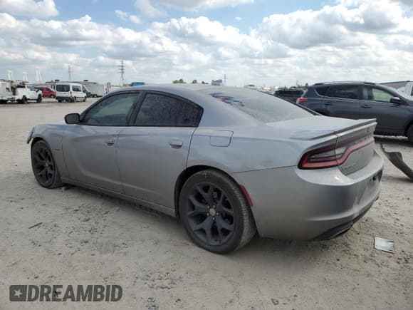 ✅ 2015 Dodge Charger RT • VIN: 2C3CDXCT9FH863033 • Lot: 87444235. Listed on Copart with 163,603 mi. Free auction sales archive from the USA and detailed vehicle history report at DreamBid. Image 2.