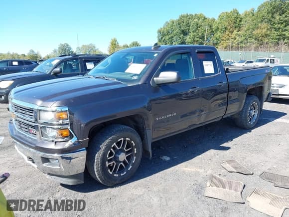 ✅ 2015 Chevrolet Silverado 1500 LT • VIN: 1GCVKREC5FZ224554 • Lot: 43407732. Listed on IAAI with 144,468 mi. Free auction sales archive from the USA and detailed vehicle history report at DreamBid. Image 2.