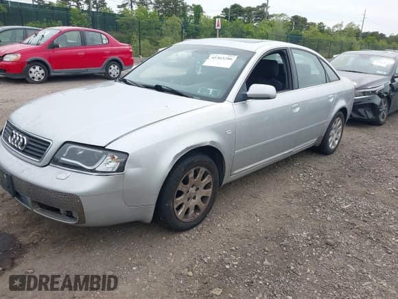 ✅ 2000 Audi A6 • VIN: WAUEH24B6YN024000 • Lot: 42363286. Listed on IAAI with 166,511 mi. Free auction sales archive from the USA and detailed vehicle history report at DreamBid. Image 2.