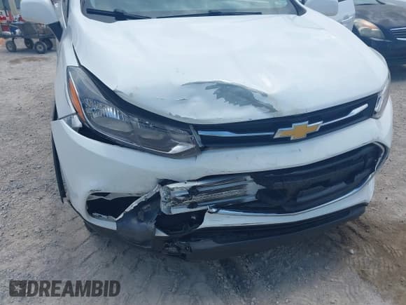 ✅ 2022 Chevrolet Trax LS • VIN: KL7CJNSM0NB527682 • Lot: 42468268. Listed on IAAI with 36,045 mi. Free auction sales archive from the USA and detailed vehicle history report at DreamBid. Image 6.