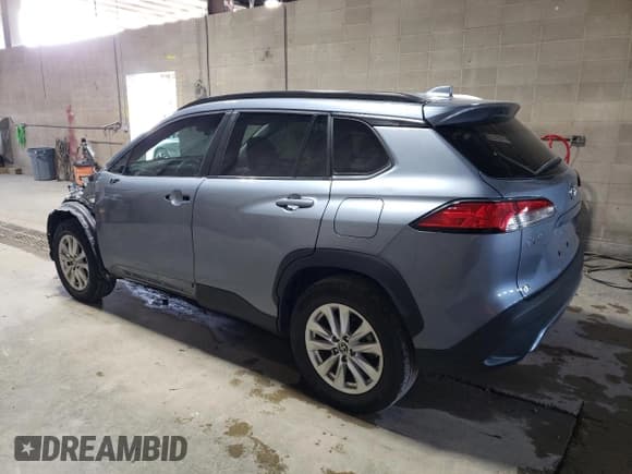 ✅ 2023 Toyota Corolla Cross LE • VIN: 7MUCAAAG9PV039470 • Lot: 68522515. Wystawiony na Copart z przebiegiem 63 653 mil. Bezpłatny archiwum sprzedaży aukcyjnych z USA i szczegółowy raport historii pojazdu na DreamBid. Zdjęcie 2.