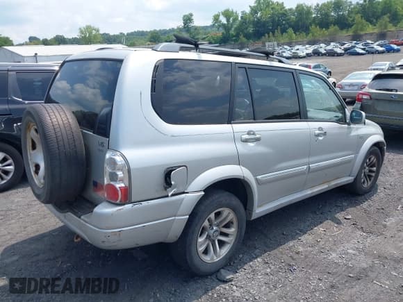 ✅ 2005 Suzuki XL7 LX • VIN: JS3TX92V654100059 • Lot: 42985604. Listed on IAAI with 220,000 mi. Free auction sales archive from the USA and detailed vehicle history report at DreamBid. Image 4.