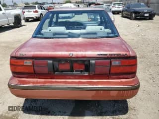 ✅ 1991 Toyota Corolla • VIN: 1NXAE94A0MZ235179 • Lot: 67806155. Listed on Copart with 103,758 mi. Free auction sales archive from the USA and detailed vehicle history report at DreamBid. Image 6.