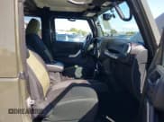 ✅ 2015 Jeep Wrangler Rubicon Hard Rock • VIN: 1C4BJWCGXFL771669 • Lot: 42057423. Listed on IAAI with 36,996 mi. Free auction sales archive from the USA and detailed vehicle history report at DreamBid. Image 5.