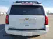 2015 Chevrolet Tahoe LTZ with VIN 1GNSKCKC1FR118128, listed as a Copart auction lot 89589135 with 129,932 mi miles and Salvage title. Bid and sale history available at DreamBid. Image 6.