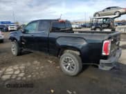 ✅ 2015 GMC Canyon 2WD SLE • VIN: 1GTH5BE32F1221248 • Лот: 91173275. Опубликован ранее на Copart с пробегом 31 190 миль. Бесплатный доступ к архиву аукционных продаж из США и подробный отчёт об истории автомобиля на DreamBid. Изображение 2.