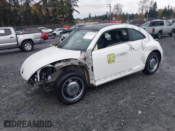 ✅ 2013 Volkswagen Beetle 2.5L • VIN: 3VWJP7AT7DM619969 • Lot: 43594617. Listed on IAAI with 10,181 mi. Free auction sales archive from the USA and detailed vehicle history report at DreamBid. Image 2.