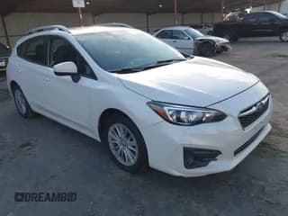 ✅ 2017 Subaru Impreza Premium • VIN: 4S3GTAD69H3719297 • Lot: 43799712. Listed on IAAI with 96,375 mi. Free auction sales archive from the USA and detailed vehicle history report at DreamBid. Image 1.
