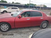 ✅ 1999 Lincoln Town Car Signature • VIN: 1LNFM82WXXY601583 • Lot: 42193270. Listed on IAAI with Not provided. Free auction sales archive from the USA and detailed vehicle history report at DreamBid. Image 14.