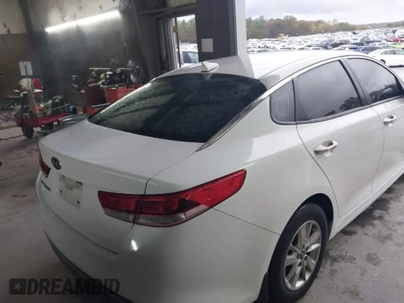 ✅ 2017 Kia Optima LX • VIN: 5XXGT4L3XHG128940 • Lot: 43537604. Listed on IAAI with 99,720 mi. Free auction sales archive from the USA and detailed vehicle history report at DreamBid. Image 4.
