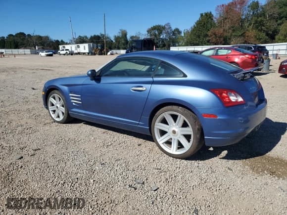 ✅ 2005 Chrysler Crossfire Limited • VIN: 1C3AN69L35X029551 • Lot: 92611625. Listed on Copart with 79,781 mi. Free auction sales archive from the USA and detailed vehicle history report at DreamBid. Image 2.