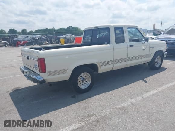 ✅ 1990 Ford Ranger • VIN: 1FTCR14T2LPB21654 • Lot: 42270150. Listed on IAAI with 92,465 mi. Free auction sales archive from the USA and detailed vehicle history report at DreamBid. Image 4.