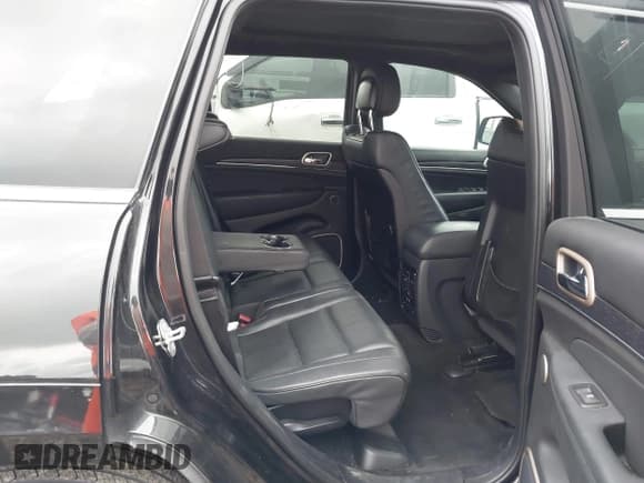 ✅ 2015 Jeep Grand Cherokee Summit • VIN: 1C4RJEJG9FC131724 • Lot: 42491343. Listed on IAAI with 131,196 mi. Free auction sales archive from the USA and detailed vehicle history report at DreamBid. Image 8.