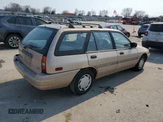 ✅ 1993 Ford Escort LX • VIN: 1FAPP15J1PW302394 • Лот: 49170485. Опубликован ранее на Copart с пробегом 71 642 миль. Бесплатный доступ к архиву аукционных продаж из США и подробный отчёт об истории автомобиля на DreamBid. Изображение 3.