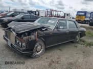✅ 1988 Rolls-Royce Silver Spirit • VIN: SCAZS02B0JCX21815 • Лот: 71994015. Опубликован ранее на Copart с пробегом 11 633 миль. Бесплатный доступ к архиву аукционных продаж из США и подробный отчёт об истории автомобиля на DreamBid. Изображение 1.
