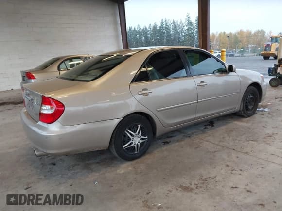 ✅ 2003 Toyota Camry XLE • VIN: 4T1BE30K13U740047 • Lot: 43628001. Listed on IAAI with 198,432 mi. Free auction sales archive from the USA and detailed vehicle history report at DreamBid. Image 4.