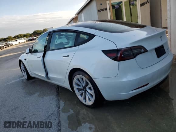 ✅ 2022 Tesla Model 3 Long Range • VIN: 5YJ3E1EBXNF181454 • Lot: 74084454. Listed on Copart with Not provided. Free auction sales archive from the USA and detailed vehicle history report at DreamBid. Image 2.