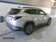 2023 Hyundai Tucson Blue z VIN KM8JBCA12PU091438, wystawiony jako Copart lot #57264655 z przebiegiem 72 768 mil mil oraz Szkoda całkowita • Salvage title. Historia ofert i sprzedaży dostępna na DreamBid. Obrazek 3.