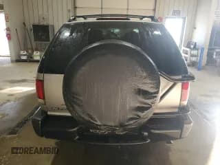✅ 2004 Chevrolet Blazer LS • VIN: 1GNCT18X34K143280 • Lot: 50494785. Wystawiony na Copart z przebiegiem Nie podano. Bezpłatny archiwum sprzedaży aukcyjnych z USA i szczegółowy raport historii pojazdu na DreamBid. Zdjęcie 6.
