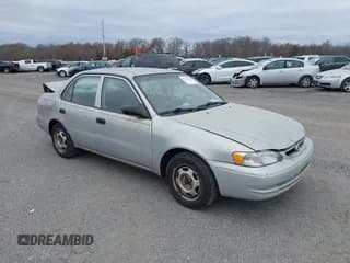 ✅ 1999 Toyota Corolla VE • VIN: 2T1BR12E1XC128924 • Lot: 43671058. Listed on IAAI with 270,679 mi. Free auction sales archive from the USA and detailed vehicle history report at DreamBid. Image 1.