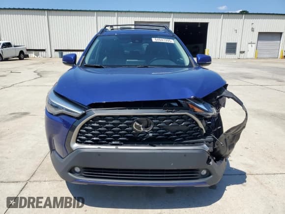 ✅ 2022 Toyota Corolla Cross XLE • VIN: 7MUEAAAG2NV033287 • Lot: 64847205. Listed on Copart with 68,805 mi. Free auction sales archive from the USA and detailed vehicle history report at DreamBid. Image 5.