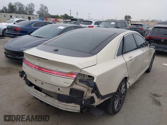 ✅ 2016 Lincoln MKZ Hybrid • VIN: 3LN6L2LU3GR630905 • Лот: 42761905. Опубликован ранее на IAAI с пробегом 105 656 миль. Бесплатный доступ к архиву аукционных продаж из США и подробный отчёт об истории автомобиля на DreamBid. Изображение 4.