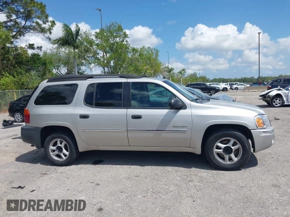 ✅ 2006 GMC Envoy SLE • VIN: 1GKES16S266146201 • Lot: 41811502. Listed on IAAI with 183,133 mi. Free auction sales archive from the USA and detailed vehicle history report at DreamBid. Image 12.