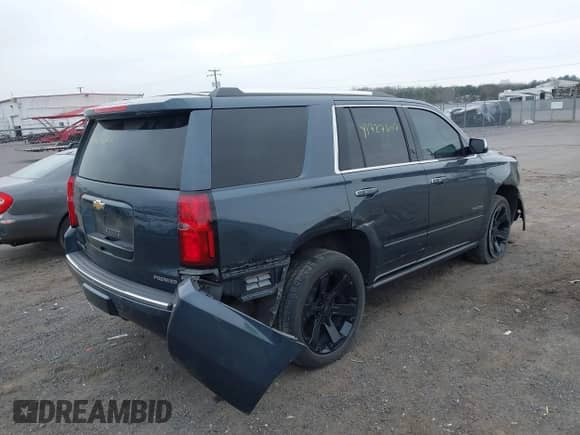 2020 Chevrolet Tahoe Premier z VIN 1GNSKCKJ6LR179033, wystawiony jako IAAI lot #41727607 z przebiegiem 26 879 mil mil oraz . Historia ofert i sprzedaży dostępna na DreamBid. Obrazek 4.