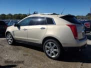 ✅ 2012 Cadillac SRX Premium Collection • VIN: 3GYFNFE31CS511984 • Лот: 86106405. Опубликован ранее на Copart с пробегом 156 274 миль. Бесплатный доступ к архиву аукционных продаж из США и подробный отчёт об истории автомобиля на DreamBid. Изображение 2.