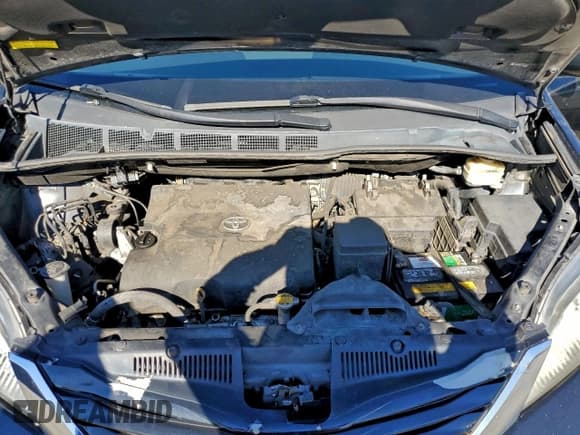 ✅ 2015 Toyota Sienna LE • VIN: 5TDKK3DC2FS664704 • Lot: 95775925. Listed on Copart with 182,327 mi. Free auction sales archive from the USA and detailed vehicle history report at DreamBid. Image 12.