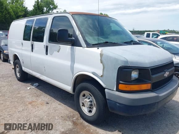 ✅ 2009 Chevrolet Express Cargo • VIN: 1GCGG25C991136904 • Lot: 42616402. Listed on IAAI with 165,309 mi. Free auction sales archive from the USA and detailed vehicle history report at DreamBid. Image 1.
