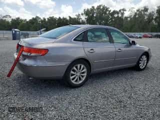 2007 Hyundai Azera SE с VIN KMHFC46FX7A216846, выставлен на аукционе Copart как лот 60035695 с пробегом 197 201 миль миль и Списание • Salvage title. История ставок и продаж доступна на DreamBid. Изображение 3.