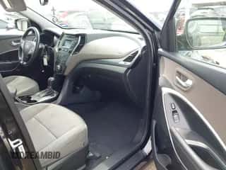 2014 Hyundai Santa Fe z VIN 5XYZU3LB0EG187445, wystawiony jako IAAI lot #43295530 z przebiegiem 117 959 mil mil oraz . Historia ofert i sprzedaży dostępna na DreamBid. Obrazek 5.