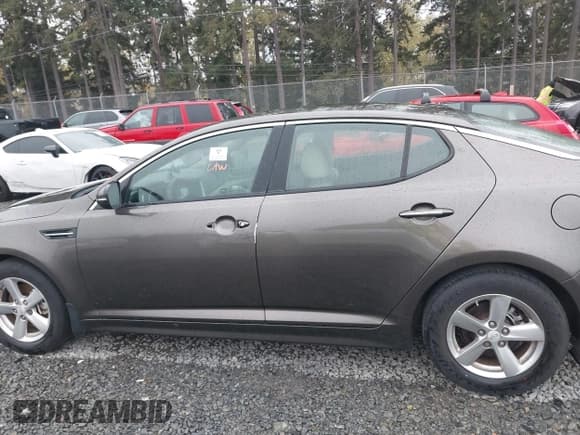 ✅ 2015 Kia Optima LX • VIN: 5XXGM4A73FG393490 • Lot: 43536650. Wystawiony na IAAI z przebiegiem Nie podano. Bezpłatny archiwum sprzedaży aukcyjnych z USA i szczegółowy raport historii pojazdu na DreamBid. Zdjęcie 14.