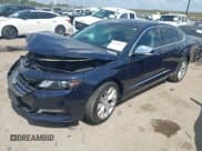 ✅ 2018 Chevrolet Impala Premier • VIN: 1G1125S31JU128768 • Lot: 43371673. Listed on IAAI with 104,013 mi. Free auction sales archive from the USA and detailed vehicle history report at DreamBid. Image 2.