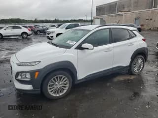 ✅ 2019 Hyundai Kona SEL • VIN: KM8K2CAA7KU338465 • Лот: 71828344. Опубликован ранее на Copart с пробегом 50 579 миль. Бесплатный доступ к архиву аукционных продаж из США и подробный отчёт об истории автомобиля на DreamBid. Изображение 1.