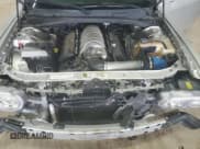 ✅ 2010 Dodge Challenger SRT-8 • VIN: 2B3CJ7DW5AH219133 • Lot: 67546894. Wystawiony na Copart z przebiegiem 87 395 mil. Bezpłatny archiwum sprzedaży aukcyjnych z USA i szczegółowy raport historii pojazdu na DreamBid. Zdjęcie 11.