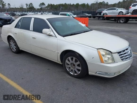 ✅ 2007 Cadillac DTS Luxury II • VIN: 1G6KD57Y67U227317 • Lot: 41392756. Listed on IAAI with 198,380 mi. Free auction sales archive from the USA and detailed vehicle history report at DreamBid. Image 1.