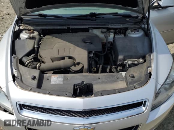 ✅ 2012 Chevrolet Malibu 1LT • VIN: 1G1ZC5E02CF383700 • Lot: 68556544. Listed on Copart with 83,495 mi. Free auction sales archive from the USA and detailed vehicle history report at DreamBid. Image 11.