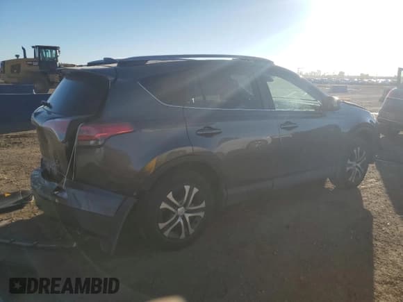 ✅ 2018 Toyota RAV4 LE • VIN: JTMBFREV0JJ739588 • Lot: 85723775. Listed on Copart with 123,603 mi. Free auction sales archive from the USA and detailed vehicle history report at DreamBid. Image 3.