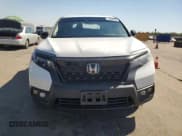 ✅ 2021 Honda Passport EX-L • VIN: 5FNYF7H52MB008411 • Lot: 70598655. Listed on Copart with 94,422 mi. Free auction sales archive from the USA and detailed vehicle history report at DreamBid. Image 5.