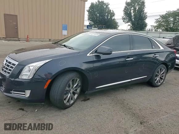 ✅ 2013 Cadillac XTS Luxury • VIN: 2G61R5S38D9196993 • Lot: 68119225. Wystawiony na Copart z przebiegiem 142 498 mil. Bezpłatny archiwum sprzedaży aukcyjnych z USA i szczegółowy raport historii pojazdu na DreamBid. Zdjęcie 13.