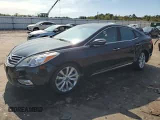 2013 Hyundai Azera z VIN KMHFH4JG9DA223008, wystawiony jako Copart lot #69859494 z przebiegiem 119 310 mil mil oraz Szkoda całkowita • Salvage title. Historia ofert i sprzedaży dostępna na DreamBid. Obrazek 1.