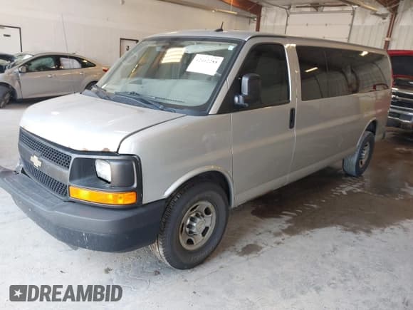 ✅ 2012 Chevrolet Express Passenger 1LS • VIN: 1GAZGZFG0C1187114 • Lot: 42462288. Listed on IAAI with 293,657 mi. Free auction sales archive from the USA and detailed vehicle history report at DreamBid. Image 2.