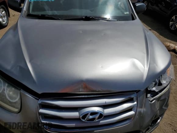 ✅ 2012 Hyundai Santa Fe GLS • VIN: 5XYZGDAB5CG130803 • Лот: 68308744. Опубликован ранее на Copart с пробегом 123 729 миль. Бесплатный доступ к архиву аукционных продаж из США и подробный отчёт об истории автомобиля на DreamBid. Изображение 11.