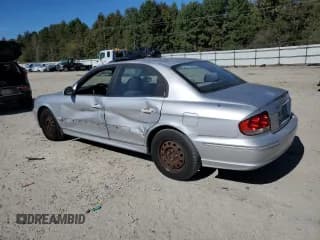 ✅ 2003 Hyundai Sonata • VIN: KMHWF25SX3A818800 • Lot: 82638495. Listed on Copart with 127,008 mi. Free auction sales archive from the USA and detailed vehicle history report at DreamBid. Image 2.