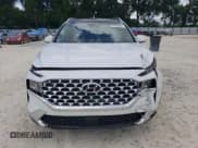 ✅ 2021 Hyundai Santa Fe SEL • VIN: 5NMS34AJ3MH333894 • Lot: 69723244. Wystawiony na Copart z przebiegiem 22 819 mil. Bezpłatny archiwum sprzedaży aukcyjnych z USA i szczegółowy raport historii pojazdu na DreamBid. Zdjęcie 5.