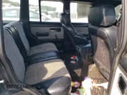 ✅ 1987 Jeep Grand Wagoneer • VIN: 1JCMR7518HT063048 • Lot: 67514294. Wystawiony na Copart z przebiegiem 111 399 mil. Bezpłatny archiwum sprzedaży aukcyjnych z USA i szczegółowy raport historii pojazdu na DreamBid. Zdjęcie 10.