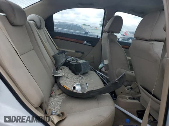 ✅ 2011 Chevrolet Aveo 1LT • VIN: KL1TD5DE2BB194095 • Lot: 60280535. Wystawiony na Copart z przebiegiem 147 857 mil. Bezpłatny archiwum sprzedaży aukcyjnych z USA i szczegółowy raport historii pojazdu na DreamBid. Zdjęcie 10.